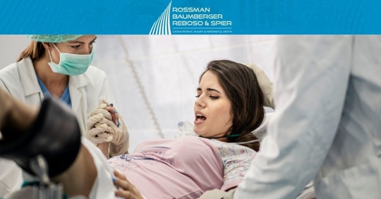 Woman giving birth in hospital