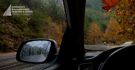 car driving in fall season rain
