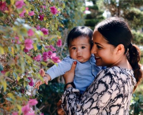 mother holding a baby