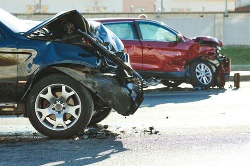 two damaged cars after a serious accident